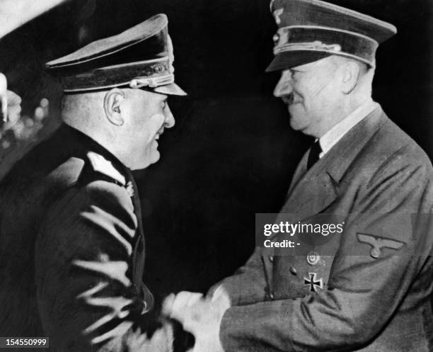 German nazi leader Adolf Hitler shakes hands with Italian dictator Benito Mussolini on June 02, 1941 at the Brenner Pass in the German-Italian border...