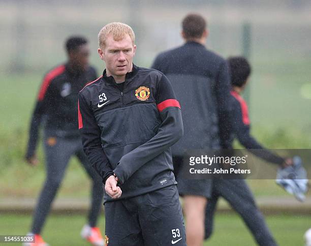 Paul Scholes of Manchester United in action during a first team training session, ahead of their UEFA Champions League match against SC Braga, at...