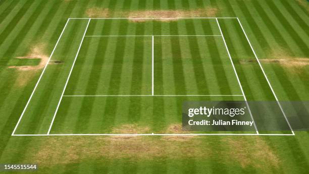General view of worn grass on Centre Court ahead of the Women's Singles Final between Marketa Vondrousova of Czech Republic and Ons Jabeur of Tunisia...
