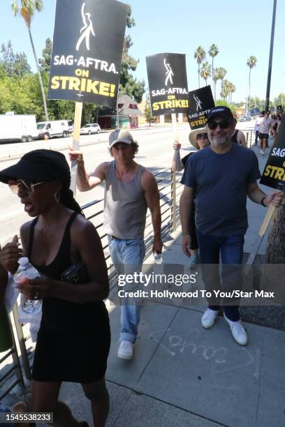 Jeremy Allen White walks the picket line in support of the SAG-AFTRA and WGA strike on July 20, 2023 in Los Angeles, California.