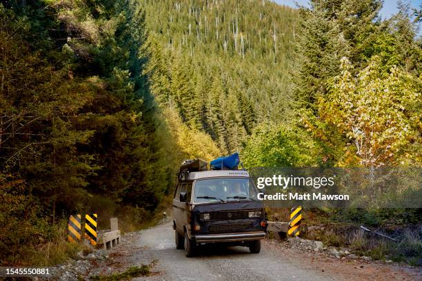 driving a camper van in the carmanah walbran provincial park vancouver island bc canada - carmanah walbran provincial park stockfoto's en -beelden