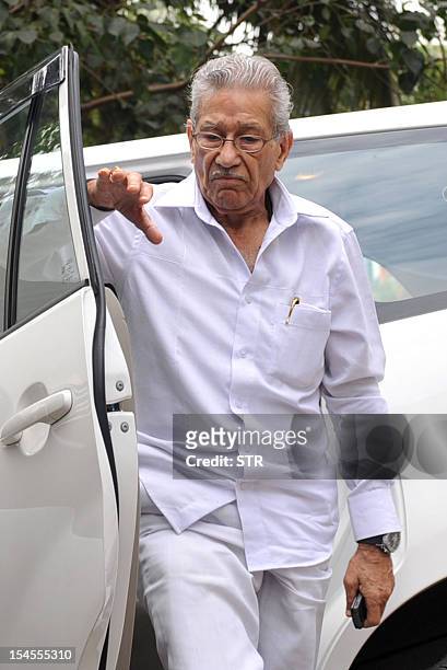 Indian Bollywood film director Rajkumar Kohli leaves after paying his last respects to Bollywood legendary Hindi film director Yash Raj Chopra at...
