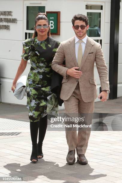 Priyanka Chopra Jonas and Nick Jonas attend day thirteen of the Wimbledon Tennis Championships at All England Lawn Tennis and Croquet Club on July...