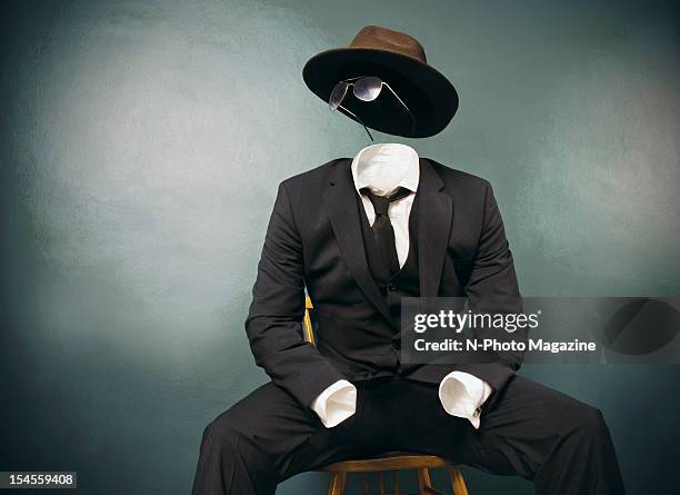 This image has been digitally manipulated) An invisible man in a suit, dark glasses and fedora, taken on April 12, 2012.