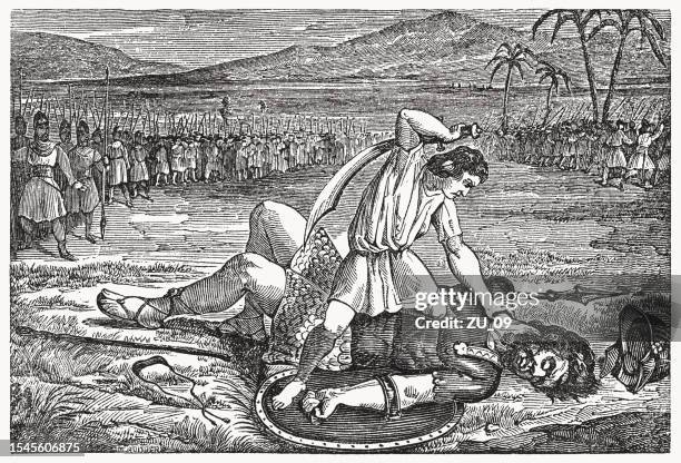 david kills goliath (1 samuel 17), wood engraving, published 1835 - old testament stock illustrations