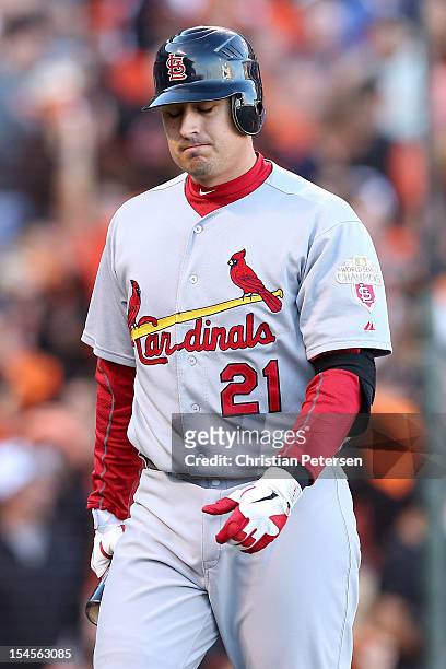 Allen Craig of the St. Louis Cardinals reacts after striking out in the fourth inning against the San Francisco Giants in Game Six of the National...
