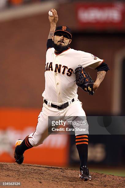 Sergio Romo of the San Francisco Giants pitches in the ninth inning against the St. Louis Cardinals in Game Six of the National League Championship...
