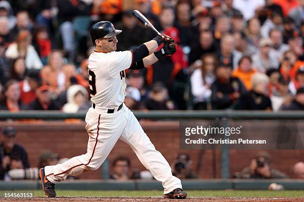 Marco Scutaro of the San Francisco Giants at bat against the St. Louis Cardinals in Game Six of the National League Championship Series at AT&T Park...