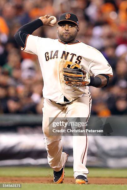 Pablo Sandoval of the San Francisco Giants throws the ball to first base while taking on the St. Louis Cardinals in Game Six of the National League...