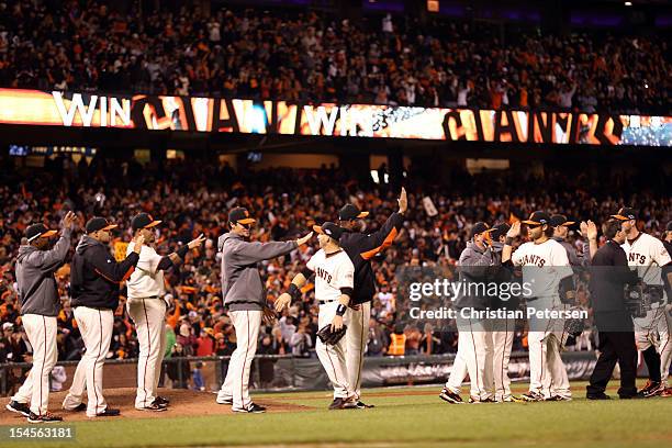 The San Francisco Giants celebrate the Giants 6-1 victory against the St. Louis Cardinals in Game Six of the National League Championship Series at...