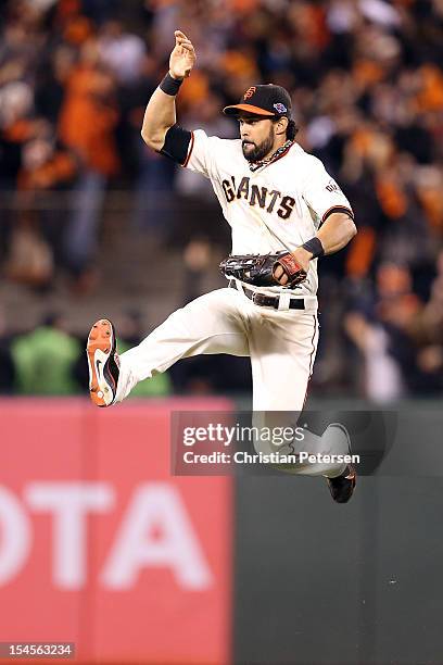 Angel Pagan of the San Francisco Giants celebrates the Giants 6-1 victory against the St. Louis Cardinals in Game Six of the National League...