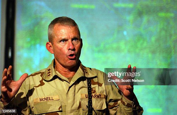 Army General Dan McNeill, Coalition Joint Task Force 180 commander, speaks to the news media inside the recently constructed CJTF-180 Joint...