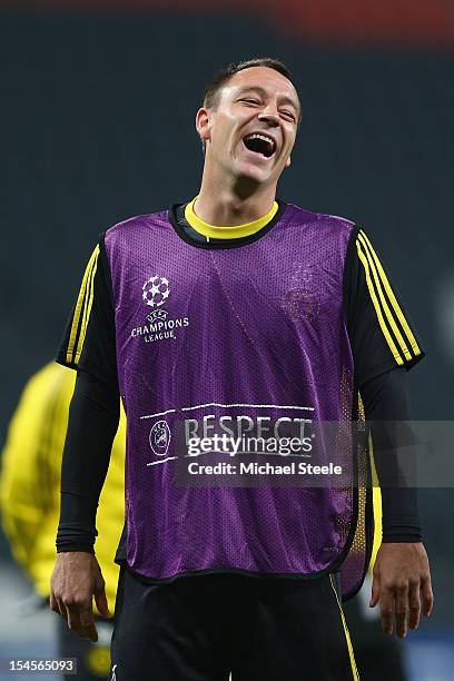 John Terry sees the funny side during the Chelsea Training session ahead of the UEFA Champions League Group E match between Shakhtar Donetsk and...