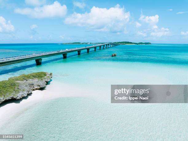 tropical water and bridge, miyakojima, okinawa, japan - okinawa prefecture stock pictures, royalty-free photos & images