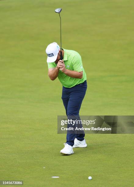 Tyrrell Hatton of England reacts to a missed putt on the 18th green during Day Three of the Genesis Scottish Open at The Renaissance Club on July 15,...