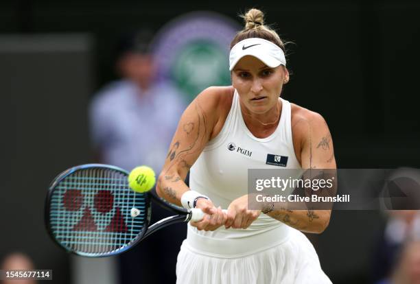 Marketa Vondrousova of Czech Republic plays a backhand during the Women's Singles Final against Ons Jabeur of Tunisia on day thirteen of The...