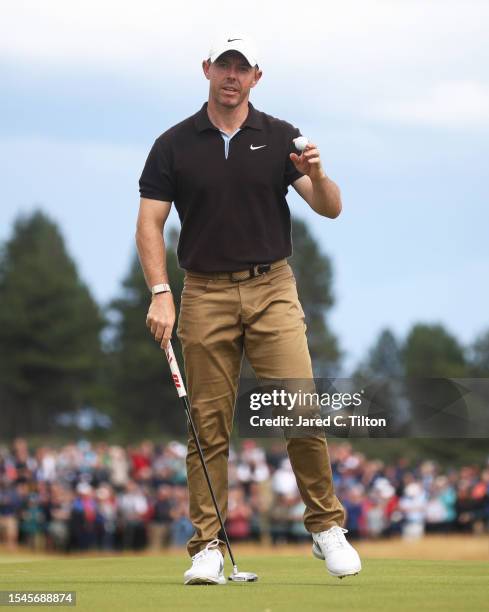 Rory McIlroy of Northern Ireland acknowledges the crowd on the 18th green during Day Three of the Genesis Scottish Open at The Renaissance Club on...