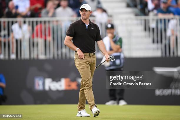Rory McIlroy of Northern Ireland reacts on the 18th green during Day Three of the Genesis Scottish Open at The Renaissance Club on July 15, 2023 in...