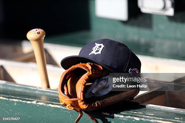 Detail of a Detroit Tigers hat with an official postseason logo is seen on the bat rack in the udgout againstthe New York Yankees during game four of...