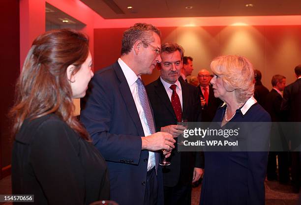 Camilla, Duchess of Cornwall speaks with journalists, including Tom Mockeridge and John Witherow as she attends A Hard Calling-Reporting from the...