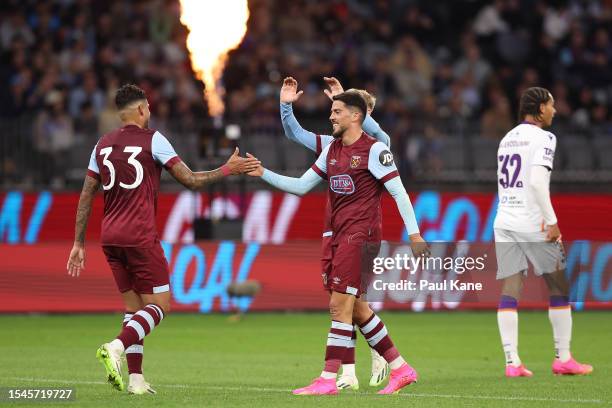 Emerson Palmieri and Pablo Fornals of West Ham celebrate a goal during the pre-season friendly match between Perth Glory and West Ham United at Optus...