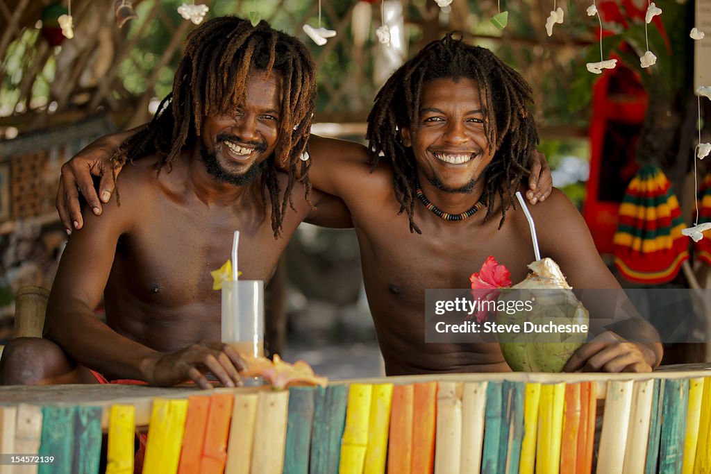 Best friends drinking a cocktail