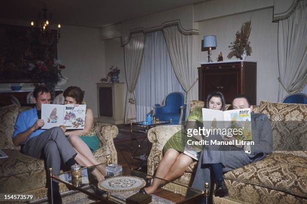 At Neuilly-sur-Seine in Uderzo: sitting on sofas in the lounge, from left to right, Albert Uderzo and his wife Ada, Gilberte and her husband Rene...