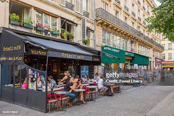 street cafe, paris, france - le marais stock pictures, royalty-free photos & images