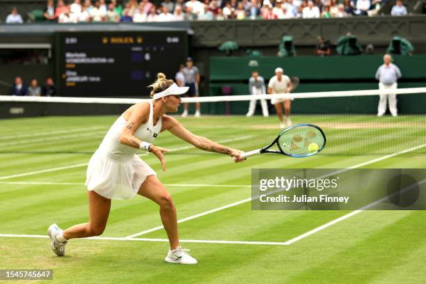 Marketa Vondrousova of Czech Republic plays a backhand during the Women's Singles Final against Ons Jabeur of Tunisia on day thirteen of The...