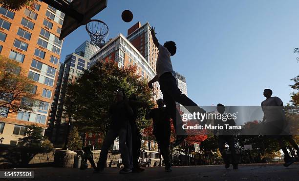 People play basketball in Lower Manhattan on October 22, 2012 in New York City. The Census Bureau reported last month that between 2000 and 2010 the...