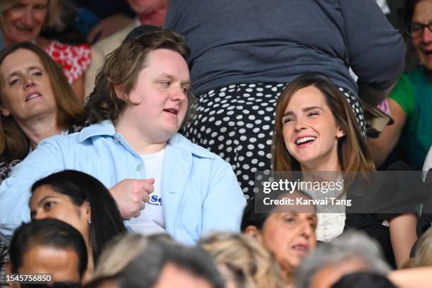 Lewis Capaldi and Emma Watson speak as they attend day thirteen of the Wimbledon Tennis Championships at All England Lawn Tennis and Croquet Club on...