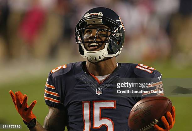 Brandon Marshall of the Chicago Bears celebrates a first quarter touchdown catch against the Detroit Lions at Soldier Field on October 22, 2012 in...