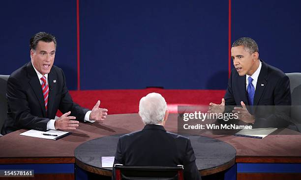 President Barack Obama debates with Republican presidential candidate Mitt Romney as moderator Bob Schieffer of CBS looks on at the Keith C. And...