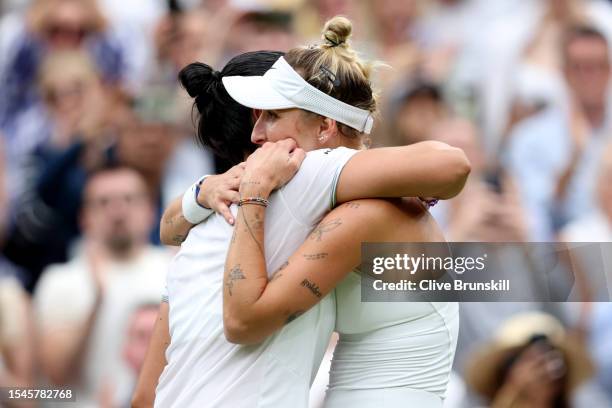 Marketa Vondrousova of Czech Republic embraces her opponent following her victory in the Women's Singles Final against Ons Jabeur of Tunisia on day...