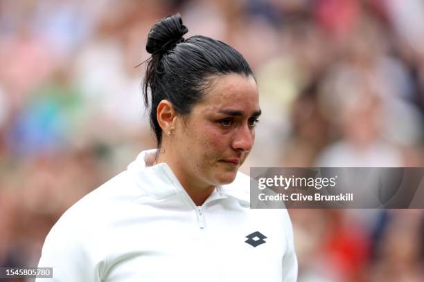 Ons Jabeur of Tunisia looks dejected following defeat in the Women's Singles Final against Marketa Vondrousova of Czech Republic on day thirteen of...