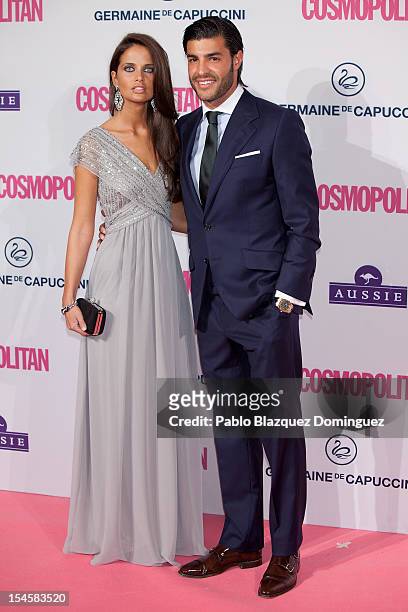 Football player Miguel Torres and girlfriend attend Cosmopolitan Fun Fearless Awards 2012 at Ritz Hotel on October 22, 2012 in Madrid, Spain.