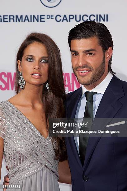 Football player Miguel Torres and girlfriend attend Cosmopolitan Fun Fearless Awards 2012 at Ritz Hotel on October 22, 2012 in Madrid, Spain.