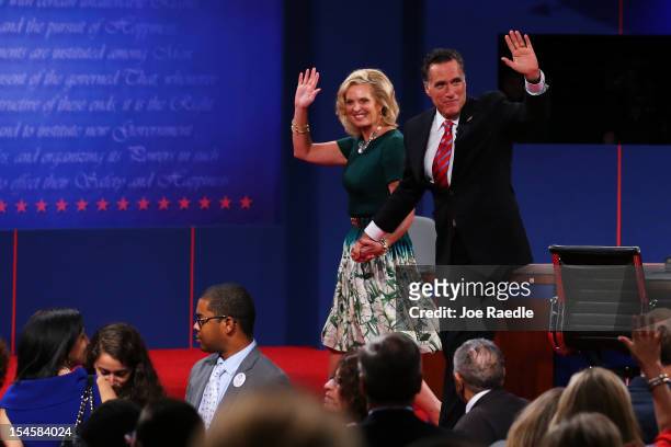 Republican presidential candidate Mitt Romney with wife, Ann Romney wave on stage after the debate at the Keith C. And Elaine Johnson Wold Performing...