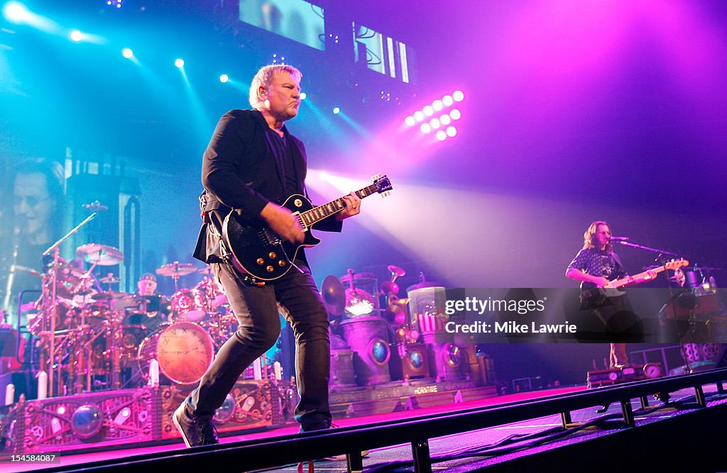 Musicians Neil Peart Alex Lifeson And Geddy Lee Of Rush Performs At musicians-neil-peart-alex-lifeson-and-geddy-lee-of-rush-performs-at