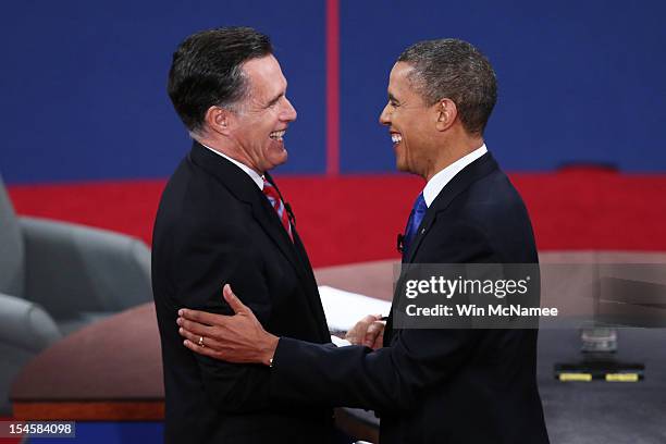 President Barack Obama shakes hands with Republican presidential candidate Mitt Romney after the debate at the Keith C. And Elaine Johnson Wold...