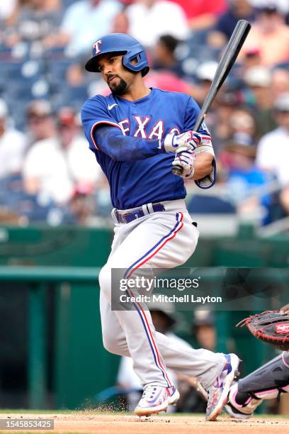 Marcus Semien of the Texas Rangers takes a swing during a baseball game against the Washington Nationals at Nationals Park on July 8, 2023 in...