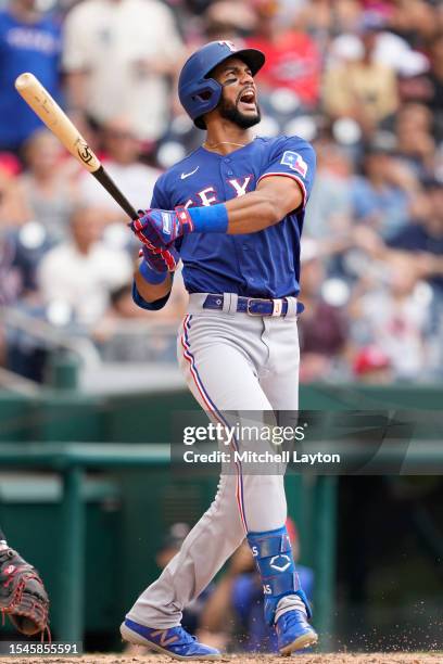 Leody Taveras of the Texas Rangers takes a swing during a baseball game against the Washington Nationals at Nationals Park on July 8, 2023 in...