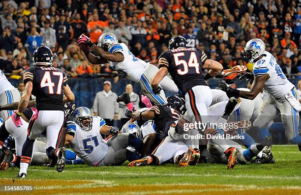 Joique Bell of the Detroit Lions ties to dive into the end zone instead he fumbled the ball against the Chicago Bears on October 22, 2012 at Soldier...