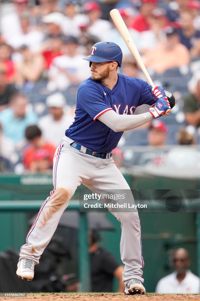 Texas Ranger Heim Jonah Heim of the Texas Rangers prepares for a pitch during a... News ...