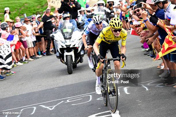 Tadej Pogacar of Slovenia and UAE Team Emirates - White best young jersey and Jonas Vingegaard of Denmark and Team Jumbo-Visma - Yellow leader jersey...