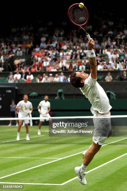 Neal Skupski of Great Britain plays an overhead shot in the Men's Doubles Finals against Marcel Granollers of Spain and Horacio Zeballos of Argentina...