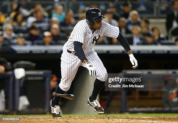 Curtis Granderson of the New York Yankees in action against the Baltimore Orioles during Game Five of the American League Division Series at Yankee...