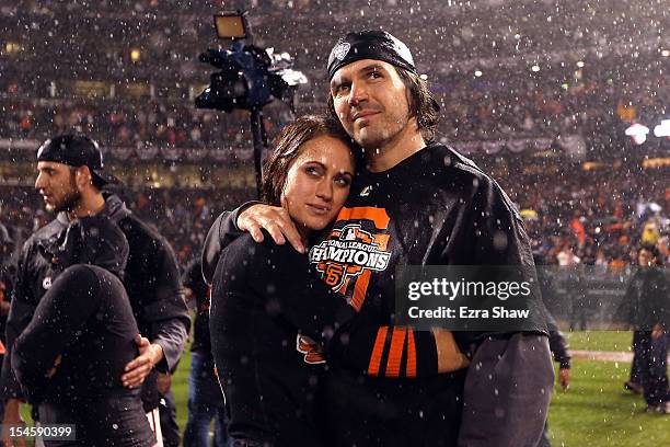 Barry Zito of the San Francisco Giants and wife Amber Zito celebrate after the Giants 9-0 victory against the St. Louis Cardinals in Game Seven of...