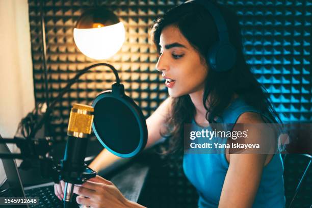 young and beautiful asian businesswoman and entrepreneur sharing her life stories and experience on a podcast or live broadcast - story telling in the workplace stock pictures, royalty-free photos & images