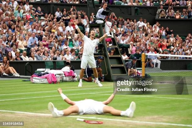Neal Skupski of Great Britain and Wesley Koolhof of the Netherlands celebrate match point in the Men's Doubles Finals against Marcel Granollers of...